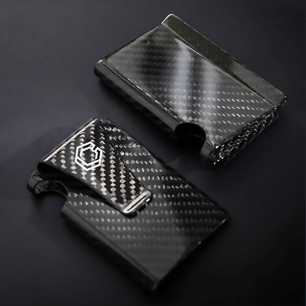 Two Carboluxe carbon fiber slim wallets, front and back