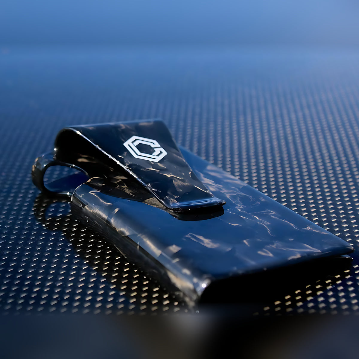 Close-up of Carboluxe forged carbon fiber wallet and money clip